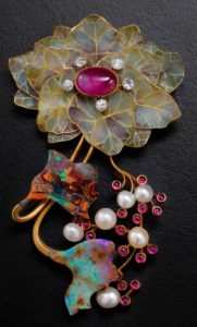 Flower with diamonds, pearls, rubies and enamel Philippe Wolfers Vintage Jewelry in a Modern Style