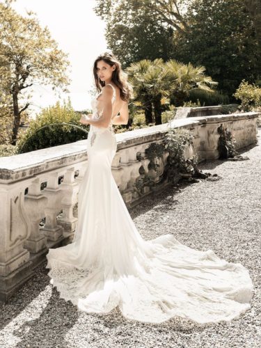 White bodycone wedding dress with plume Alessandro Angelozzi Couture Bridal 2020 Collection