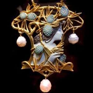 Rene Lalique pearls, enamel golden "Woman" brooch