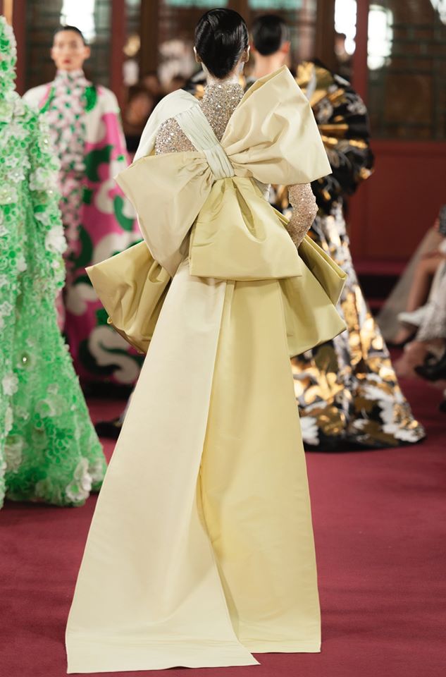 Pile yellow kimono style gown Valentino Haute Couture Collection in Beijing