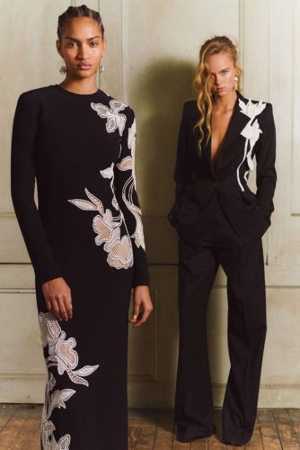 Black dress and suit with white flowers Oscar de la Renta pre-fall 2020
