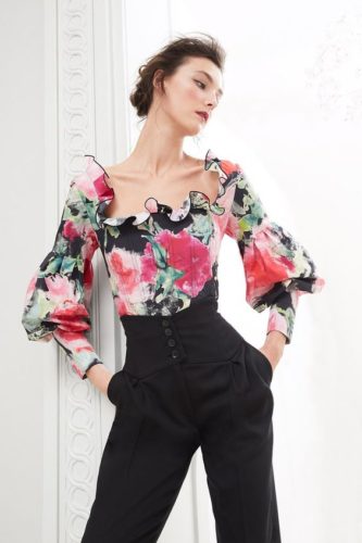 Floral blouse and highwaisted black pants Marchesa Pre-Fall 2020